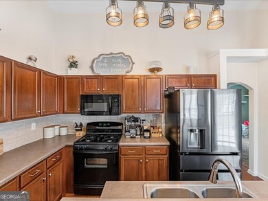 Seller is offering a generous $10,000 buyer credit at closing to on Bridgemill Golf Club in Georgia - for sale on GolfHomes.com, golf home, golf lot