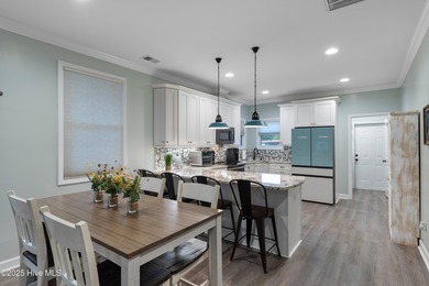 Welcome to 301 NE 51st Street where island life meets everyday on Founders Club At St. James Plantation in North Carolina - for sale on GolfHomes.com, golf home, golf lot