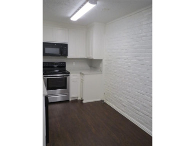 AFFORDABLE 2 bedroom 2 bath townhome is centrally located for on Prairie Lakes Golf Club in Texas - for sale on GolfHomes.com, golf home, golf lot