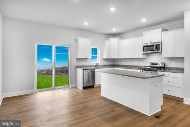 READY NOW!  END UNIT BAYLOR WITH DECK & 3RD BATHROOM!  Move in on Plantation Lakes Golf and Country Club in Delaware - for sale on GolfHomes.com, golf home, golf lot