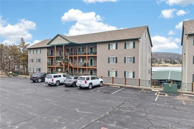 walk-out unit located in the desirable building 159 at Cedar on Lake Valley Country Club in Missouri - for sale on GolfHomes.com, golf home, golf lot