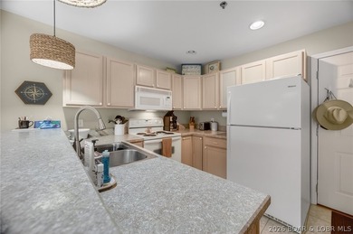 walk-out unit located in the desirable building 159 at Cedar on Lake Valley Country Club in Missouri - for sale on GolfHomes.com, golf home, golf lot