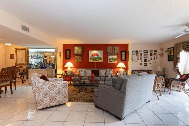 LOWER PRICE FOR 3/2 CONDO WITH GOLF. SUNNY FLORIDA OPPORTUNITY on Poinciana Golf Club in Florida - for sale on GolfHomes.com, golf home, golf lot