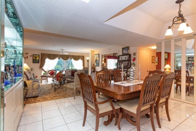 LOWER PRICE FOR 3/2 CONDO WITH GOLF. SUNNY FLORIDA OPPORTUNITY on Poinciana Golf Club in Florida - for sale on GolfHomes.com, golf home, golf lot