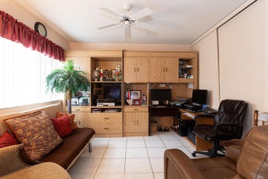 LOWER PRICE FOR 3/2 CONDO WITH GOLF. SUNNY FLORIDA OPPORTUNITY on Poinciana Golf Club in Florida - for sale on GolfHomes.com, golf home, golf lot