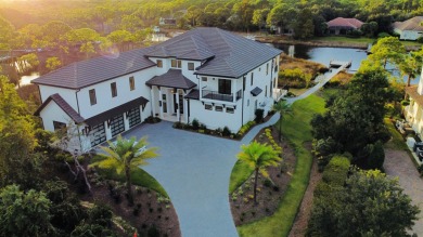Introducing the epitome of Luxury Waterfront Living- a on Kelly Plantation Golf Club in Florida - for sale on GolfHomes.com, golf home, golf lot