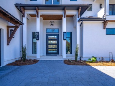 Introducing the epitome of Luxury Waterfront Living- a on Kelly Plantation Golf Club in Florida - for sale on GolfHomes.com, golf home, golf lot