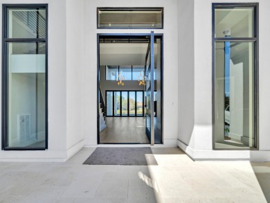 Introducing the epitome of Luxury Waterfront Living- a on Kelly Plantation Golf Club in Florida - for sale on GolfHomes.com, golf home, golf lot
