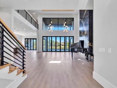 Introducing the epitome of Luxury Waterfront Living- a on Kelly Plantation Golf Club in Florida - for sale on GolfHomes.com, golf home, golf lot