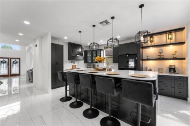 This absolute beauty of a home is the textbook definition of a on Eastwood Golf Club in Florida - for sale on GolfHomes.com, golf home, golf lot