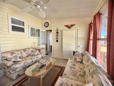 This beautifully maintained 3-bedroom home offers an on Fairway Village Golf Course in Florida - for sale on GolfHomes.com, golf home, golf lot