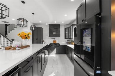 This absolute beauty of a home is the textbook definition of a on Eastwood Golf Club in Florida - for sale on GolfHomes.com, golf home, golf lot