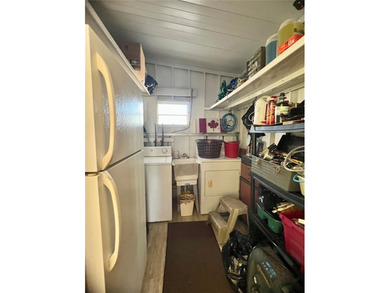 This beautifully maintained 3-bedroom home offers an on Fairway Village Golf Course in Florida - for sale on GolfHomes.com, golf home, golf lot