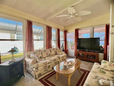 This beautifully maintained 3-bedroom home offers an on Fairway Village Golf Course in Florida - for sale on GolfHomes.com, golf home, golf lot