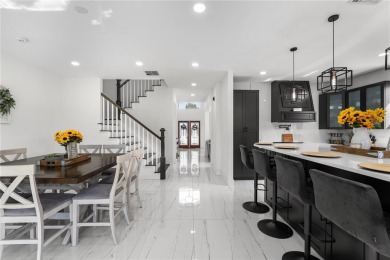 This absolute beauty of a home is the textbook definition of a on Eastwood Golf Club in Florida - for sale on GolfHomes.com, golf home, golf lot