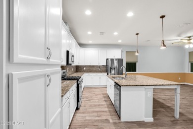 Bimini Island Collection Beauty!! Step into coastal elegance on LPGA International Golf Course in Florida - for sale on GolfHomes.com, golf home, golf lot