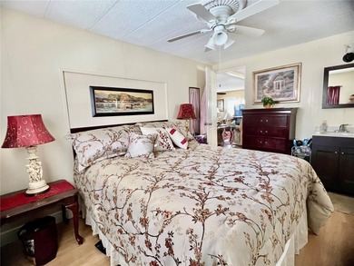 This beautifully maintained 3-bedroom home offers an on Fairway Village Golf Course in Florida - for sale on GolfHomes.com, golf home, golf lot