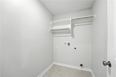 Welcome to this warm and inviting 4-bedroom, 2.5-bathroom on Golf Club of Creekmoor in Missouri - for sale on GolfHomes.com, golf home, golf lot