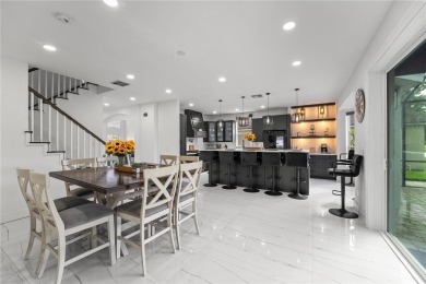 This absolute beauty of a home is the textbook definition of a on Eastwood Golf Club in Florida - for sale on GolfHomes.com, golf home, golf lot