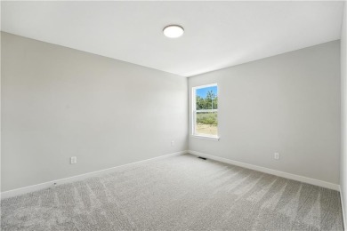 Welcome to this warm and inviting 4-bedroom, 2.5-bathroom on Golf Club of Creekmoor in Missouri - for sale on GolfHomes.com, golf home, golf lot