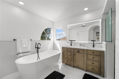 This absolute beauty of a home is the textbook definition of a on Eastwood Golf Club in Florida - for sale on GolfHomes.com, golf home, golf lot