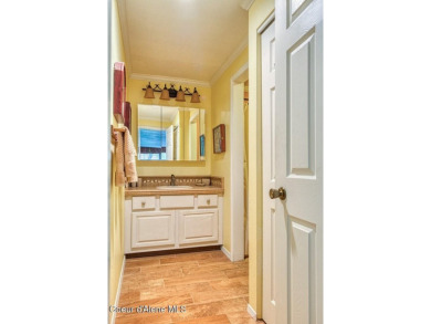Situated in the heart of Twin Lakes Village, this private on Twin Lakes Village Golf Course in Idaho - for sale on GolfHomes.com, golf home, golf lot