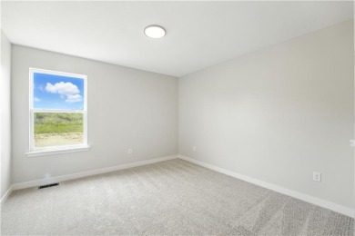 Welcome to this warm and inviting 4-bedroom, 2.5-bathroom on Golf Club of Creekmoor in Missouri - for sale on GolfHomes.com, golf home, golf lot