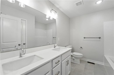 Welcome to this warm and inviting 4-bedroom, 2.5-bathroom on Golf Club of Creekmoor in Missouri - for sale on GolfHomes.com, golf home, golf lot