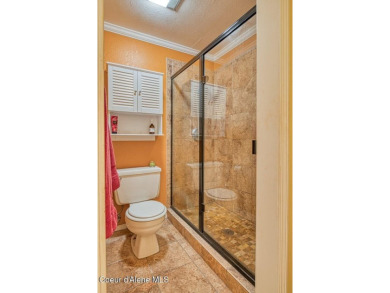 Situated in the heart of Twin Lakes Village, this private on Twin Lakes Village Golf Course in Idaho - for sale on GolfHomes.com, golf home, golf lot