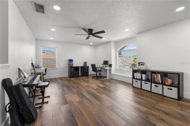 This absolute beauty of a home is the textbook definition of a on Eastwood Golf Club in Florida - for sale on GolfHomes.com, golf home, golf lot