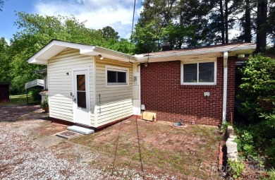 Welcome Home! Charming 2-bedroom, 2 full bath home sitting on on Rolling Hills Golf Club in North Carolina - for sale on GolfHomes.com, golf home, golf lot