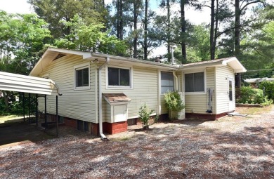 Welcome Home! Charming 2-bedroom, 2 full bath home sitting on on Rolling Hills Golf Club in North Carolina - for sale on GolfHomes.com, golf home, golf lot