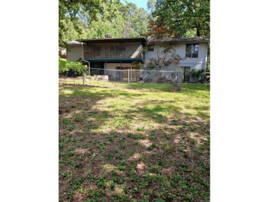 Discover the potential in this spacious 3 bedroom, 3 bath home on DeSoto Golf Course in Arkansas - for sale on GolfHomes.com, golf home, golf lot