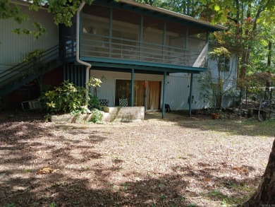 Discover the potential in this spacious 3 bedroom, 3 bath home on DeSoto Golf Course in Arkansas - for sale on GolfHomes.com, golf home, golf lot