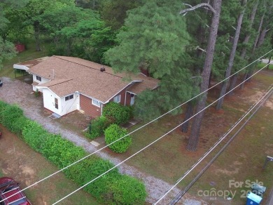 Welcome Home! Charming 2-bedroom, 2 full bath home sitting on on Rolling Hills Golf Club in North Carolina - for sale on GolfHomes.com, golf home, golf lot