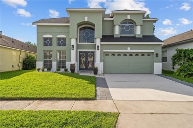 This absolute beauty of a home is the textbook definition of a on Eastwood Golf Club in Florida - for sale on GolfHomes.com, golf home, golf lot