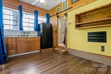 A MUST SEE!!! Escape to your own private retreat with this on The Tillery Tradition Country Club in North Carolina - for sale on GolfHomes.com, golf home, golf lot