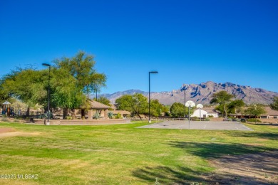 Welcome to this beautifully remodeled home in the highly on Omni Tucson National Golf Resort and Spa - Sonoran in Arizona - for sale on GolfHomes.com, golf home, golf lot