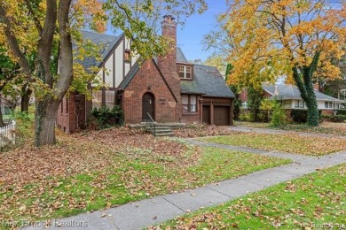 Charming tudor situated on picturesque tree lined street near on Western Golf and Country Club in Michigan - for sale on GolfHomes.com, golf home, golf lot