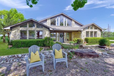 Discover serenity in this custom Stone home situated on over 1.2 on Denison Country Club in Texas - for sale on GolfHomes.com, golf home, golf lot