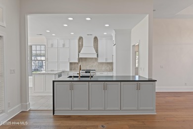 Designer renovated home in desirable Brunswick Plantation. This on Brunswick Plantation and Golf Resorts in North Carolina - for sale on GolfHomes.com, golf home, golf lot