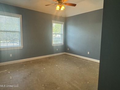 Welcome to this beautiful newly renovated 3-bedroom, 2-bath on Diamondhead Country Club in Mississippi - for sale on GolfHomes.com, golf home, golf lot