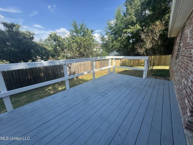 Welcome to this beautiful newly renovated 3-bedroom, 2-bath on Diamondhead Country Club in Mississippi - for sale on GolfHomes.com, golf home, golf lot