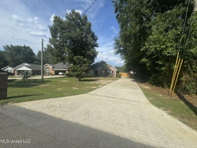 Welcome to this beautiful newly renovated 3-bedroom, 2-bath on Diamondhead Country Club in Mississippi - for sale on GolfHomes.com, golf home, golf lot