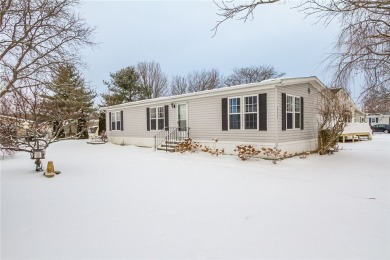 Discover the perfect blend of comfort and leisure in this on Winding Creek Executive Course in New York - for sale on GolfHomes.com, golf home, golf lot