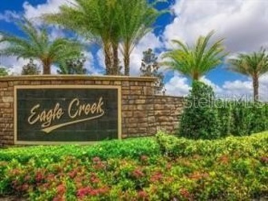 This charming 1,960 sq ft 4-bedroom, 2-bath home is located in on Eagle Creek Golf Club in Florida - for sale on GolfHomes.com, golf home, golf lot