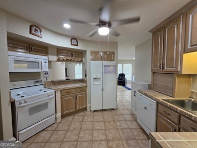 Envision yourself in this spacious 5 bedroom, 5 bathroom home on Canongate On White Oak Golf Course in Georgia - for sale on GolfHomes.com, golf home, golf lot