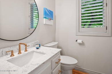 RECENTLY REMODELED SINGLE-LEVEL HAVEN IN DESIRABLE FOREST HILLS on Hayden Lake Country Club in Idaho - for sale on GolfHomes.com, golf home, golf lot
