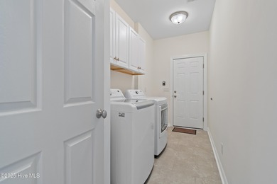 Designer renovated home in desirable Brunswick Plantation. This on Brunswick Plantation and Golf Resorts in North Carolina - for sale on GolfHomes.com, golf home, golf lot