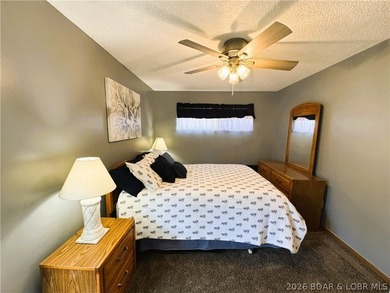 Enjoy effortless lake living in this well-kept, turn-key 1 bed on Sycamore Creek Golf Club in Missouri - for sale on GolfHomes.com, golf home, golf lot